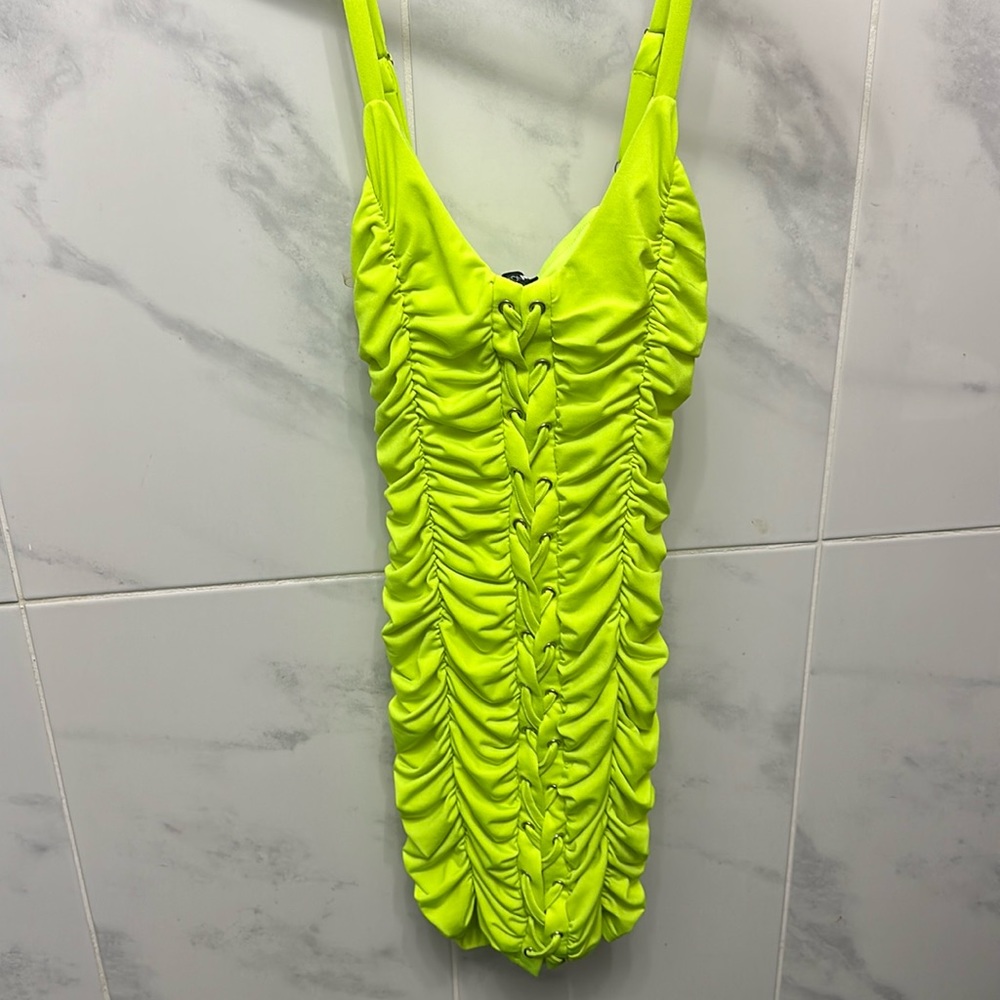 Neon green ruched bodycon dress